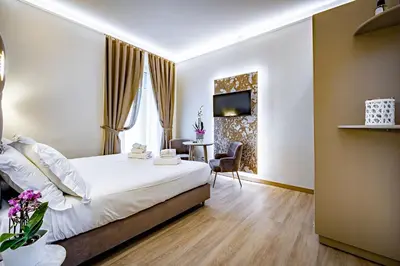 Letto o letti in una camera di Residenza Giotto