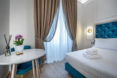 Letto o letti in una camera di Residenza Giotto