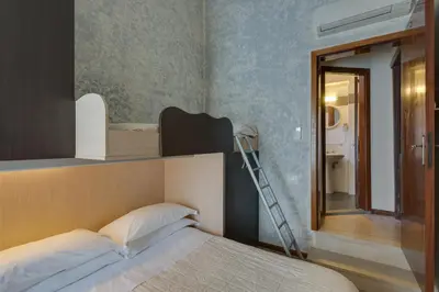 Letto o letti in una camera di Casa Billi