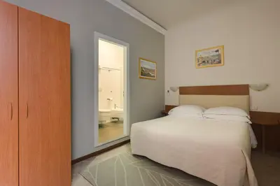 Letto o letti in una camera di Casa Billi