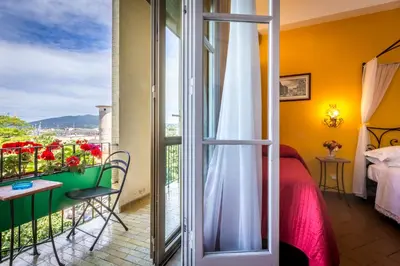 Letto o letti in una camera di B&B Antiche Armonie