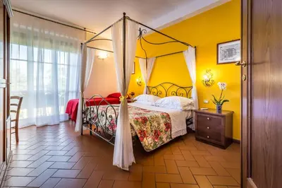 Letto o letti in una camera di B&B Antiche Armonie