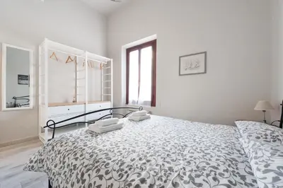 Letto o letti in una camera di Parterre Holidays