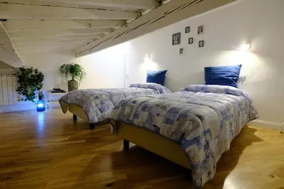 Letto o letti in una camera di Rodolfo Suite