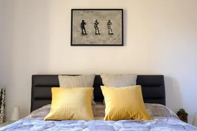 Letto o letti in una camera di Rodolfo Suite