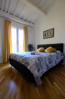 Letto o letti in una camera di Rodolfo Suite