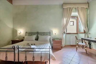 Letto o letti in una camera di Central Strozzi by Mmega