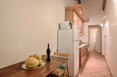 Cucina o angolo cottura di Central Strozzi by Mmega