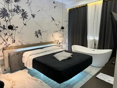 Letto o letti in una camera di Relais Stibbert Florence