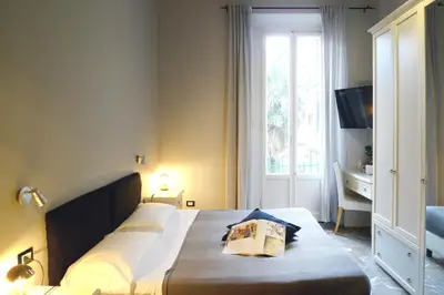 Letto o letti in una camera di Relais Stibbert Florence