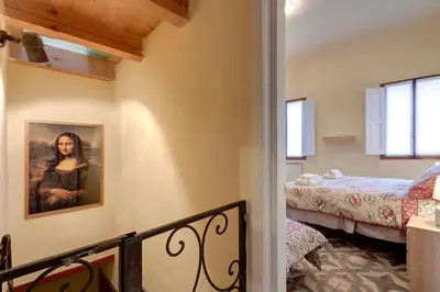 Letto o letti in una camera di Residenza MONNA LISA