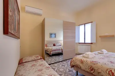 Letto o letti in una camera di Residenza MONNA LISA