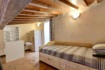 Letto o letti in una camera di Residenza MONNA LISA