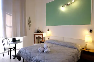 Letto o letti in una camera di Residenza Le Rondini