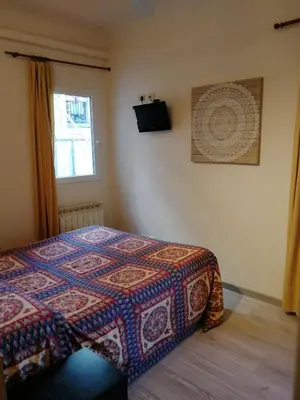 Letto o letti in una camera di Residenza Le Rondini
