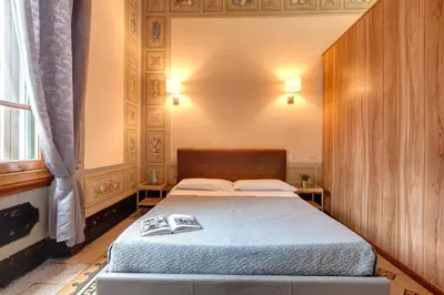 Letto o letti in una camera di Sleep Tight Florence Apartment