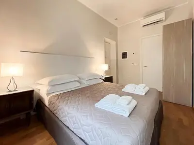 Letto o letti in una camera di Hotel la Scala
