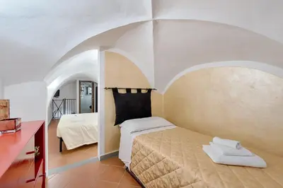 Letto o letti in una camera di Santo Spirito Frescos by Mmega