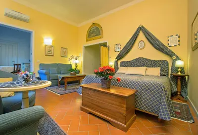 Letto o letti in una camera di La Casa Del Garbo - Luxury Rooms & Suite