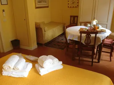 Letto o letti in una camera di La Casa Del Garbo - Luxury Rooms & Suite