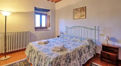 Letto o letti in una camera di Agriturismo I Ceppi