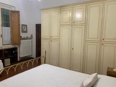 Letto o letti in una camera di B&B Le 5 Vie Appartamento con camera tripla