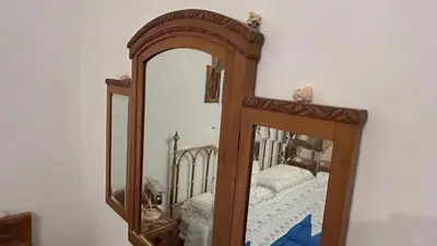 Letto o letti in una camera di B&B Le 5 Vie Appartamento con camera tripla