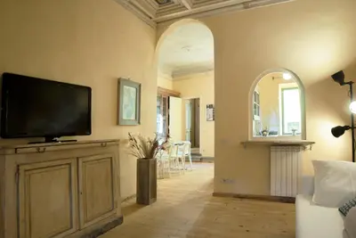 TV o dispositivi per l'intrattenimento presso Meriggio Apartment