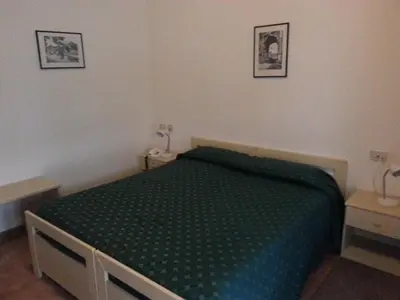 Letto o letti in una camera di Hotel Bodoni