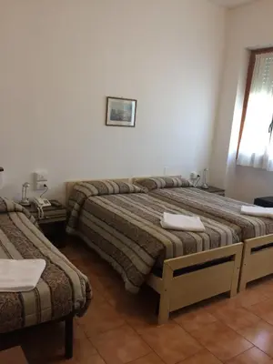 Letto o letti in una camera di Hotel Bodoni
