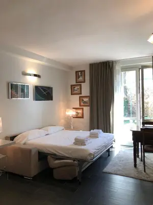 Letto o letti in una camera di Borgo Guelfo VII