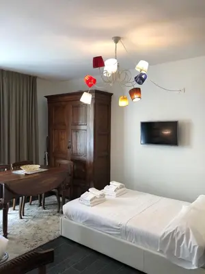 Letto o letti in una camera di Borgo Guelfo VII