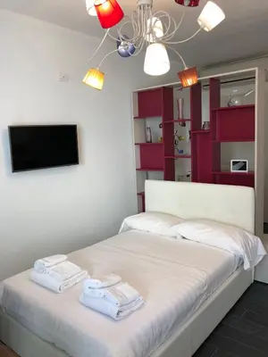 Letto o letti in una camera di Borgo Guelfo VII