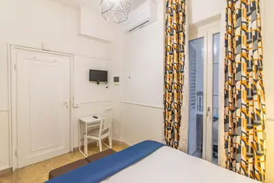 Letto o letti in una camera di Duomo View