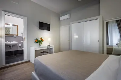 Letto o letti in una camera di Blu Notte Guest House