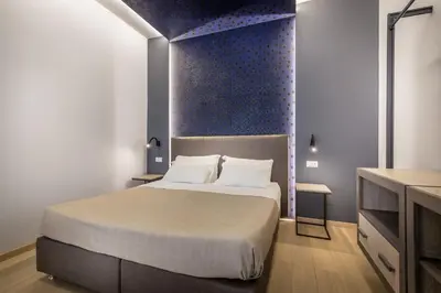 Letto o letti in una camera di Blu Notte Guest House