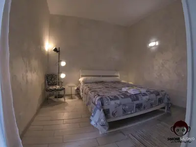 Letto o letti in una camera di Le Mosse di Anna