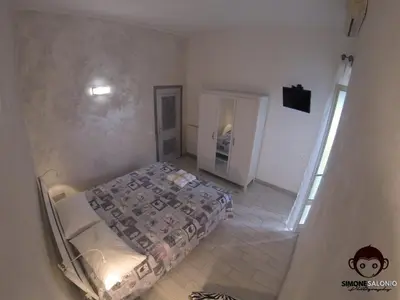 Letto o letti in una camera di Le Mosse di Anna
