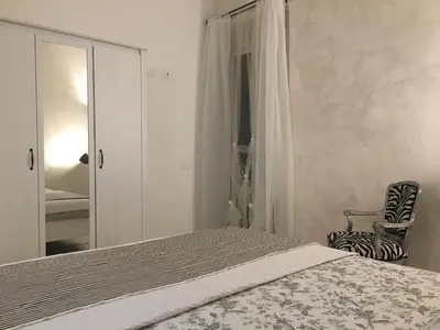 Letto o letti in una camera di Le Mosse di Anna