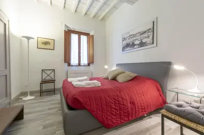 Letto o letti in una camera di Ponte Vecchio's Nest