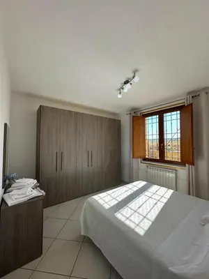 Letto o letti in una camera di Colle Del Sole