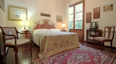 Letto o letti in una camera di Domus Giorgio