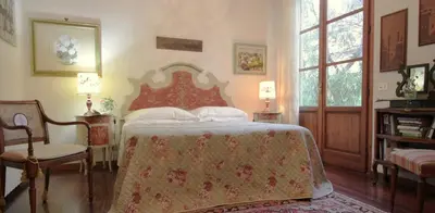 Letto o letti in una camera di Domus Giorgio