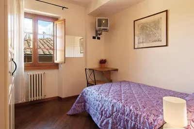 Letto o letti in una camera di B&B Arco Antico