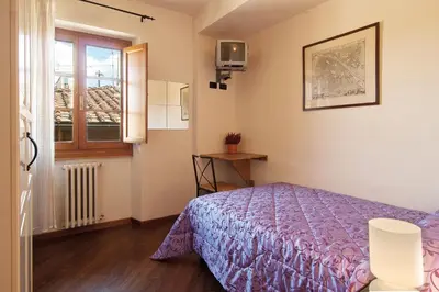 Letto o letti in una camera di B&B Arco Antico