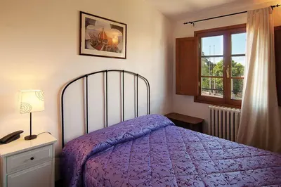 Letto o letti in una camera di B&B Arco Antico