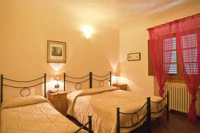 Letto o letti in una camera di B&B Arco Antico