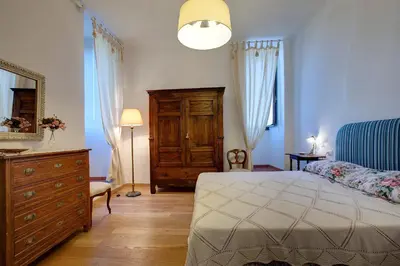 Letto o letti in una camera di Torre Donati by Mmega