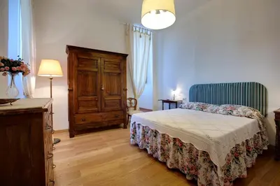 Letto o letti in una camera di Torre Donati by Mmega
