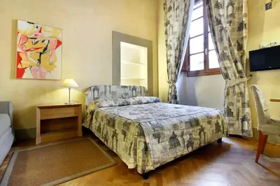 Letto o letti in una camera di Piccolo Residence Apart-Hotel